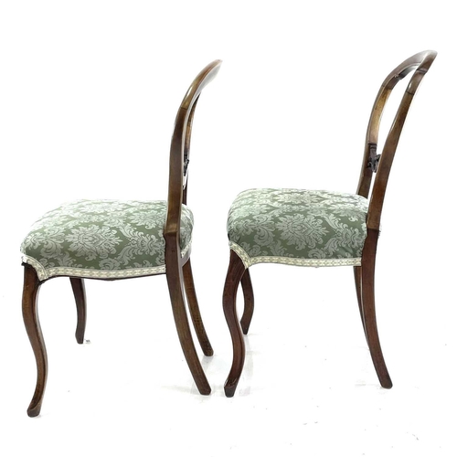 1862 - A set of three Victorian walnut balloon back dining chairs. Together with two very similar (5).