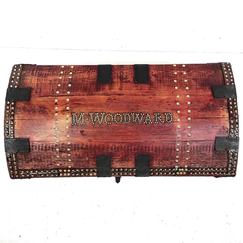 1865 - A Victorian elm dome top carriage trunk. With iron banding and brass studs, named W Woodward and wit... 