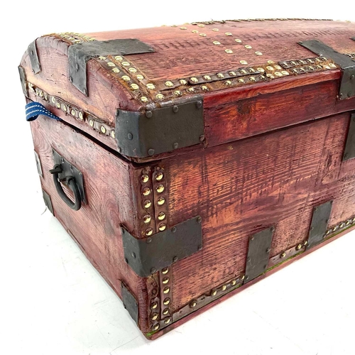 1865 - A Victorian elm dome top carriage trunk. With iron banding and brass studs, named W Woodward and wit... 