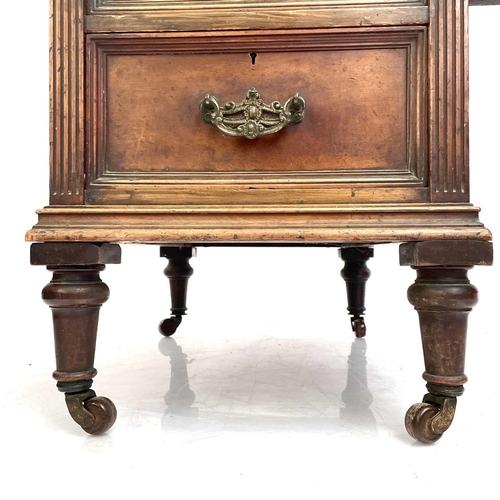 1867 - A late Victorian mahogany kneehole desk or dressing table. Fitted with one long and eight short draw... 