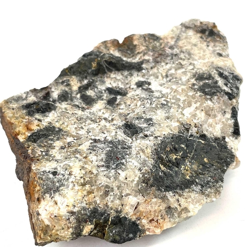 187 - Three cut cassiterite specimens. From West Wheal Eliza, Holmbush, St Austell, together with a tin in... 