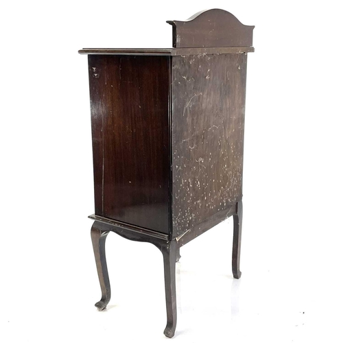 1870 - An Edwardian mahogany music cabinet. Fitted six fall-front drawers on angled cabriole legs, height 1... 