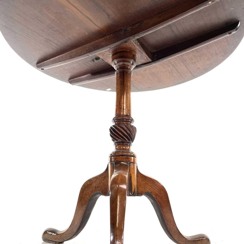 1874 - A George III mahogany tripod table. With a tip-top on a wrythen turned pillar and tripod base, heigh... 