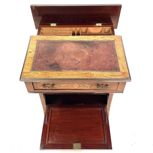 1883 - A late Victorian rosewood and inlaid Davenport desk. With a pierced brass three-quarter gallery abov... 