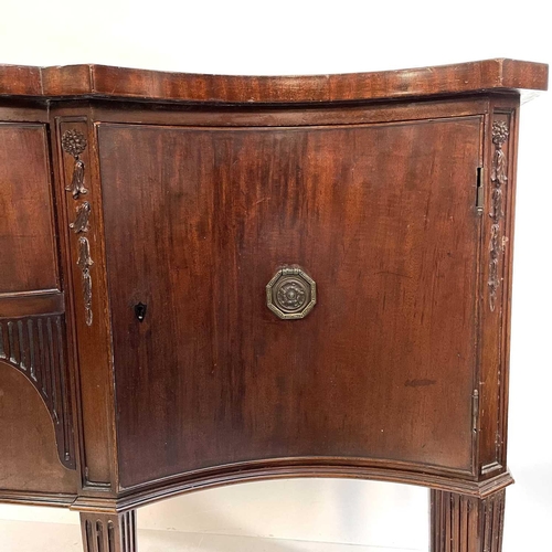 1889 - An Edwardian mahogany bow front sideboard. Fitted two central drawers and two cupboards, height 93cm... 