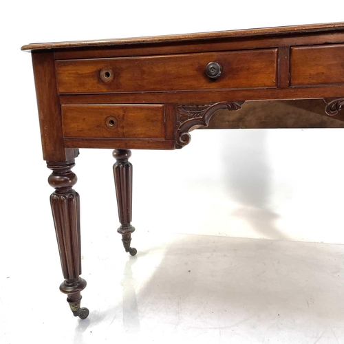 1891 - A William IV mahogany side table. With a raised back and fitted with four drawers on turned and flut... 