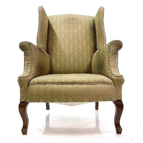 1899 - An Edwardian walnut framed wing armchair. Raised on moulded cabriole front legs, height 106cm, width... 