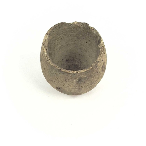 190 - An original old-time Cornish clay crucible. Height 6.25cm. This large collection of Cornish tin ingo... 