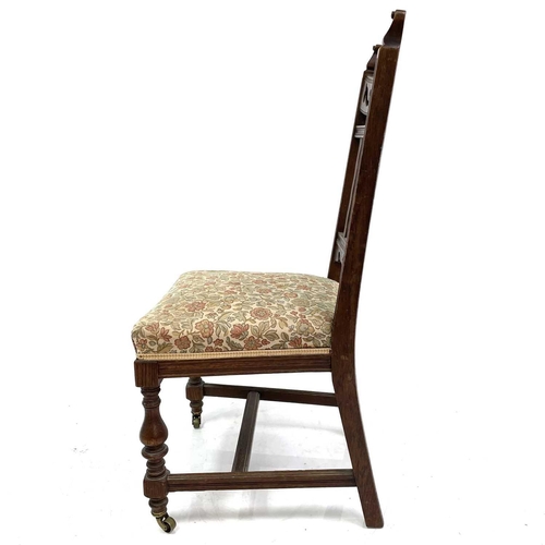 1916 - A set of four Arts and Crafts design oak dining chairs. With wavy slat backs, sprung seats and on ba... 