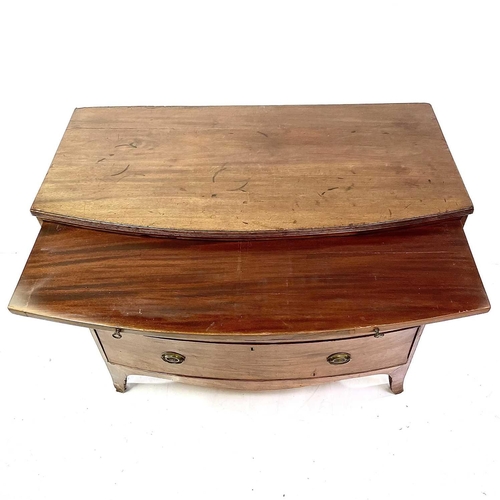 1921 - A 19th century mahogany bow front chest. Fitted a brushing slide above three graduated long drawers ... 