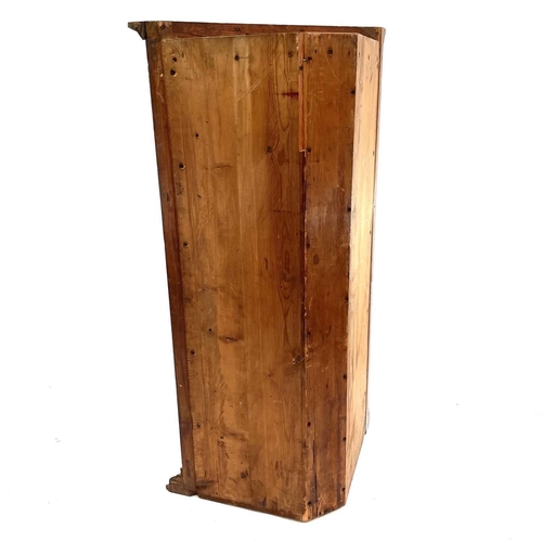 1923 - A Late Victorian pine hanging corner cupboard. .With moulded dentil cornice above a glazed door, hei... 