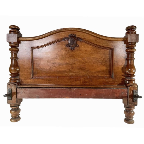 1926 - A Victorian mahogany bedhead and end. With turned supports and moulded decoration, height 107cm, tot... 