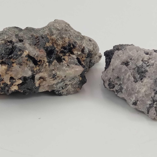 198 - Two cassiterite specimens from Baleswidden Mine, St Just. The largest 8.5cm x 5.5cm (irregular). Thi... 