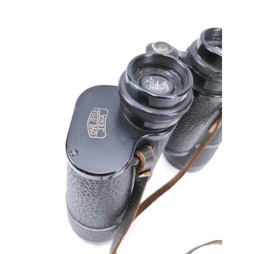 20 - Carl Zeiss Jena Telarem 18x 50 binoculars. Circa 1930s with three colour filters, original leather c... 