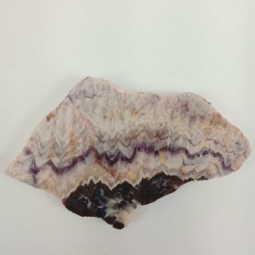 209 - A cut and polished amethyst specimen from Wheal Bellan, St Just, Cornwall. 17.5cm x 10.5cm x 1.25cm ... 