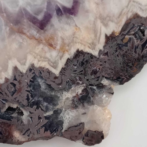 209 - A cut and polished amethyst specimen from Wheal Bellan, St Just, Cornwall. 17.5cm x 10.5cm x 1.25cm ... 