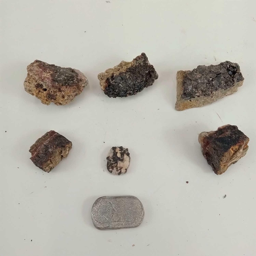 214 - Rare location tin: Six pieces of Cligga mine tin ore. Together with a piece of tin metal from Cligga... 