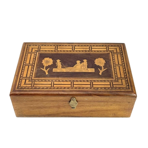 224 - A marquetry box decorated with a naive scene within parquetry borders. Height 11cm width 33.5cm dept... 