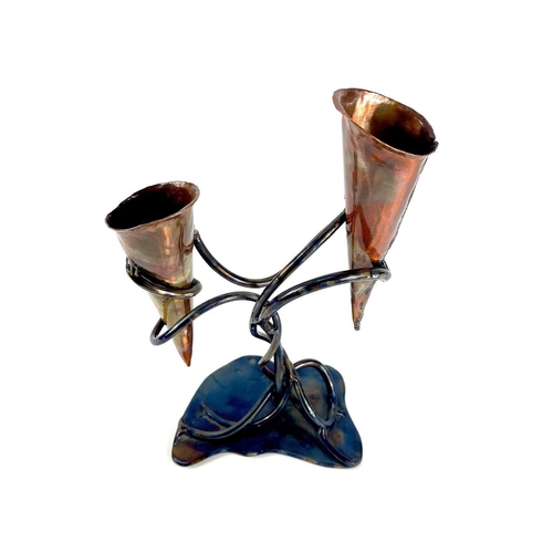 232 - PAUL HOSKIN A copper double candle holder with sinuous tempered steel supports and base, Height 34cm... 