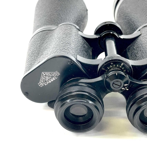 233 - A pair of Hertel & Reuss optik Tordalk 11 x 80 binoculars. With a fitted leather case.