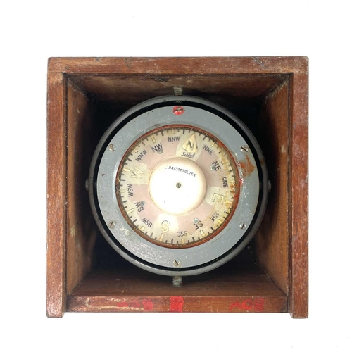 235 - A Sestral compass on a gimbal mount serial number B4/31439L/64. In a fitted box with a slide lid com... 