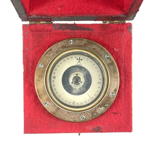 235 - A Sestral compass on a gimbal mount serial number B4/31439L/64. In a fitted box with a slide lid com... 