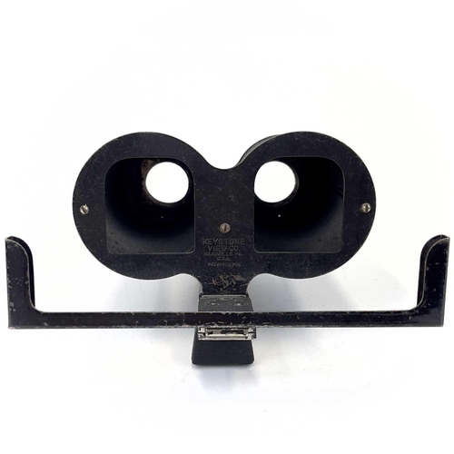 239 - A Keystone View Co metal stereoscope viewer. Together with three other early 20th century stereoscop... 