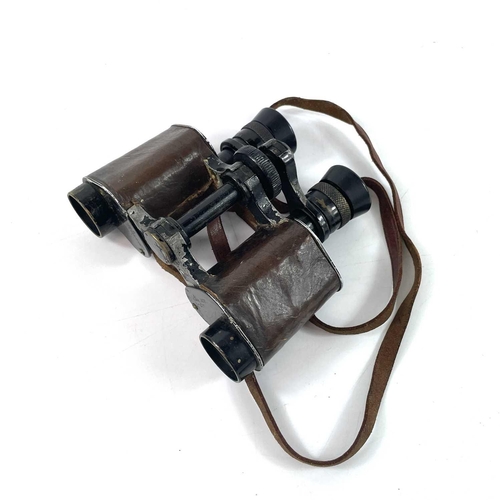 240 - A pair of Bausch & Lomb military stereo binoculars 6 x 30. Together with a pair of Ross London Stepn... 