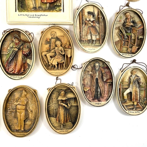 241 - A large collection of Osbourne Ivorex plaques. Mostly oval Dickens characters and a rectangular St M... 