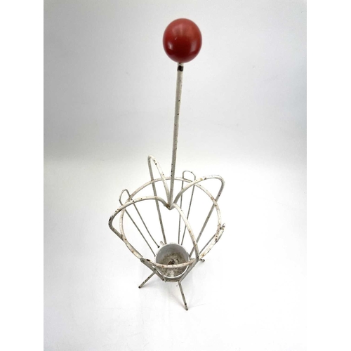 242 - An Atomic style wire umbrella stand. Height 79.5cm.