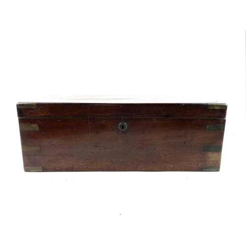 243 - A 19th century walnut and brass bound writing slope. Height 16cm width 35cm depth 23.5cm together wi... 