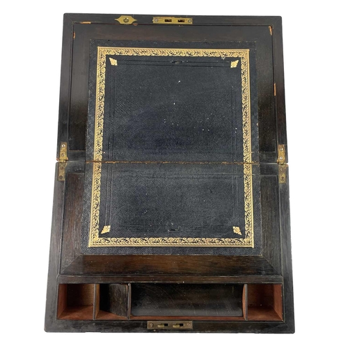 243 - A 19th century walnut and brass bound writing slope. Height 16cm width 35cm depth 23.5cm together wi... 