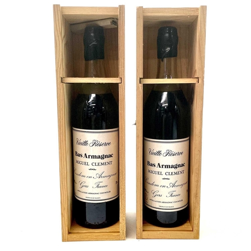 245 - Two bottles Miguel Clement Vieille Reserve Bas Armagnac. Both with wooden boxes.