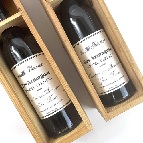 245 - Two bottles Miguel Clement Vieille Reserve Bas Armagnac. Both with wooden boxes.