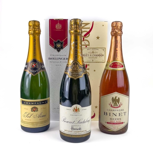 246 - A bottle of Special Cuvee Bollinger Champagne. Together with a bottle of Moet & Chandon Champagne an... 