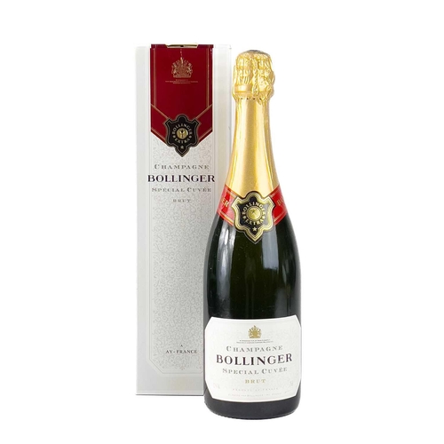 246 - A bottle of Special Cuvee Bollinger Champagne. Together with a bottle of Moet & Chandon Champagne an... 