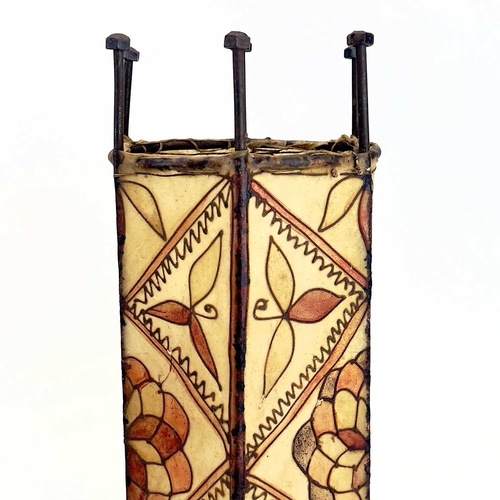 259 - A pair of metal lanterns. The hide shades having tube lined floral decoration. Height 45cm.