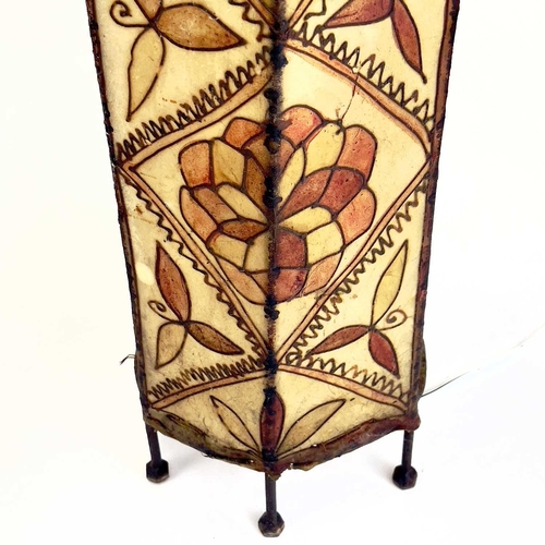 259 - A pair of metal lanterns. The hide shades having tube lined floral decoration. Height 45cm.