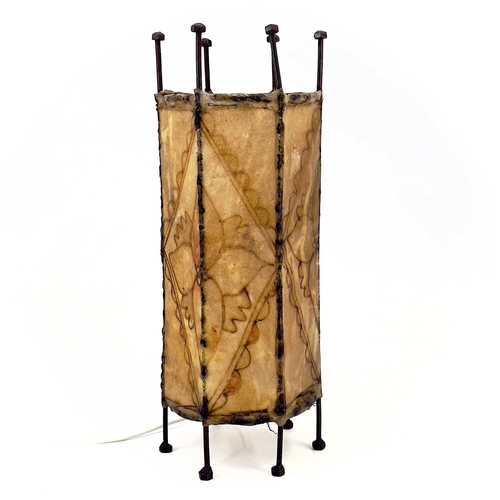 259 - A pair of metal lanterns. The hide shades having tube lined floral decoration. Height 45cm.