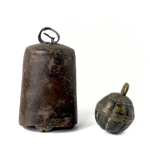 266 - An Indian bronze elephant bell. Diameter 6cm, together with a steel cow bell (2).