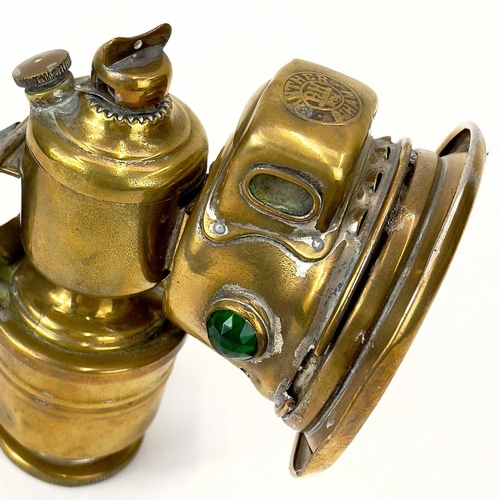 287 - An early 20th century brass bicycle lantern by Panther P&H Birmingham. Height 15cm.