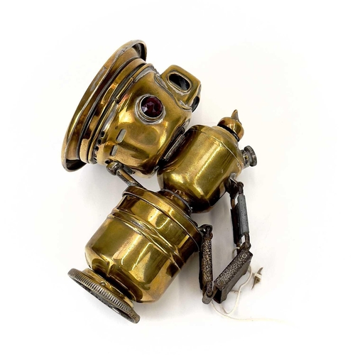 287 - An early 20th century brass bicycle lantern by Panther P&H Birmingham. Height 15cm.