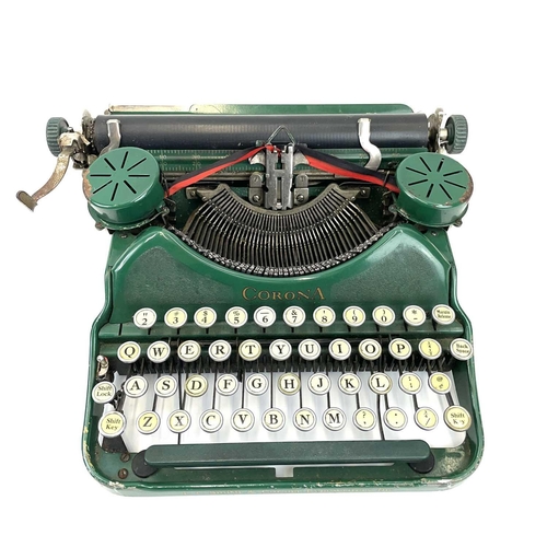 299 - A Corona portable typewriter in Bruce green. Circa 1924 serial number G1A04388, with fitted case.