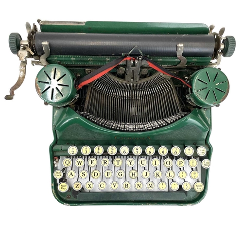 299 - A Corona portable typewriter in Bruce green. Circa 1924 serial number G1A04388, with fitted case.