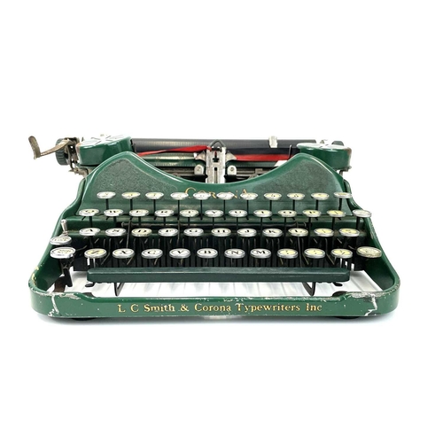 299 - A Corona portable typewriter in Bruce green. Circa 1924 serial number G1A04388, with fitted case.