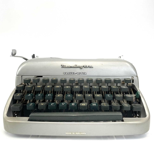 306 - A Remington Travel-Riter circa 1950s. With manual and spare ribbon and in the original travel case.