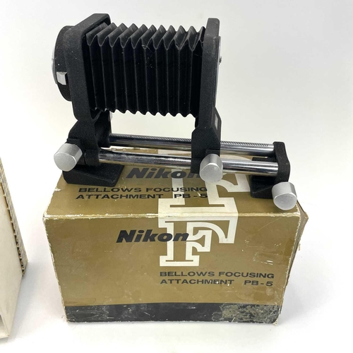 307 - A Nikon F Photomatic FTn serial number 6875184. Fitted with Nikkor-H Auto 1:2 50mm No. 795267 togeth... 