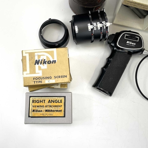 307 - A Nikon F Photomatic FTn serial number 6875184. Fitted with Nikkor-H Auto 1:2 50mm No. 795267 togeth... 