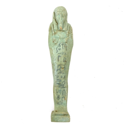 308 - An Egyptian faience shabti. Together with other Egyptian faience and pottery shabti. (4)