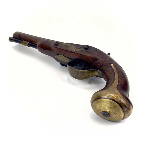 31 - A brass mounted flintlock pistol. Circa 1800, with proof marks to the barrel and brass butt cap and ... 